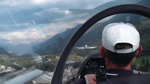 Glider flies over the peaks of mountains 스톡 동영상 79148780