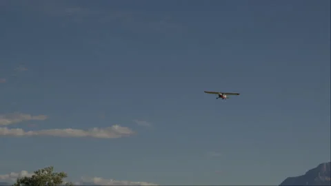 Glider flying against a mountainous backdrop Stock Footage 263133669