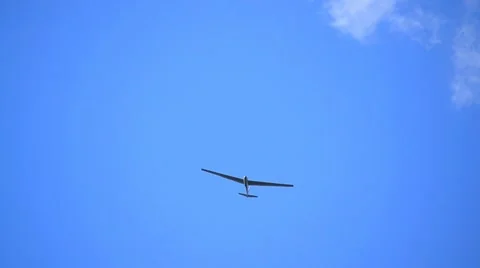 Glider isolated against blue sky Stock Footage 12191199