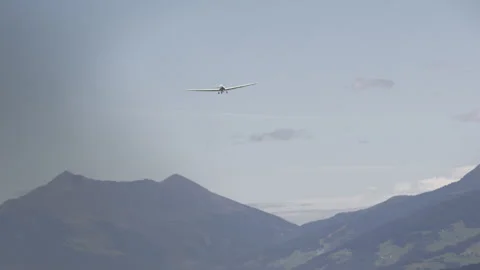 Glider soaring over mountains Stock Footage 270073714