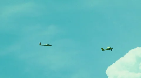 Glider Towing Plane High In the Sky Stock Footage 47841403