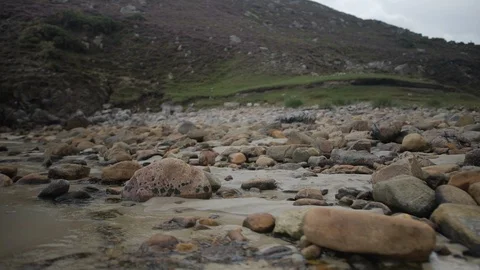 Gliding across a rocky Beach Stock-Footage 106925825