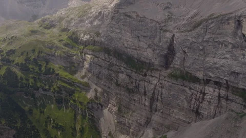 Gliding Beside Massive Limestone Escarpment in Eng Alm Austria Stock Footage 340485620
