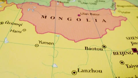 Gliding camera motion from china into mongolia on political paper atlas map Video stock 340105468