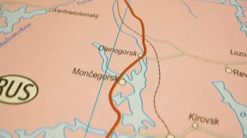 Gliding camera view over atlas map panning to Murmansk, Russia Stock Footage 343125395