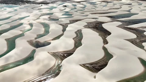 Gliding Forward Across Curving Lagoons and White Dunes in Lençóis Maranhenses Stock Footage 342440854