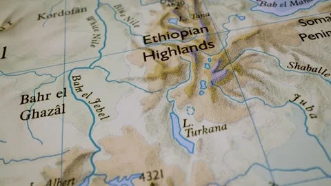 Gliding macro view to the ethiopian highlands on a physical atlas map Stock Footage 341699113