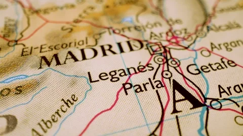 Gliding macro view over atlas map leading to Madrid, Spain Stock Footage 340917292