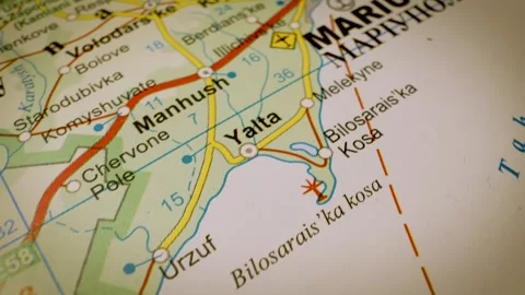 Gliding macro view over atlas map from Berdiansk to Mariupol, Ukraine Stock Footage 341269065