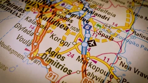 Gliding macro view over atlas map pointing toward Athens, Greece Stock Footage 341269224