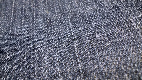 Gliding macro view over blue denim fabric texture Stock Footage 340902461