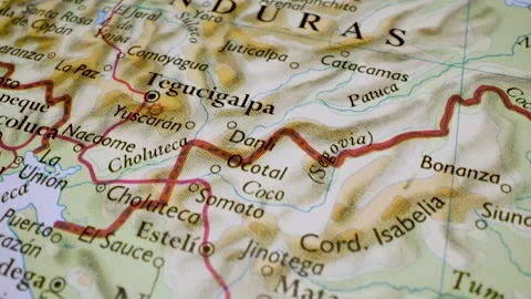 Gliding macro view over physical atlas map from Nicaragua to Honduras Stock Footage 341750956