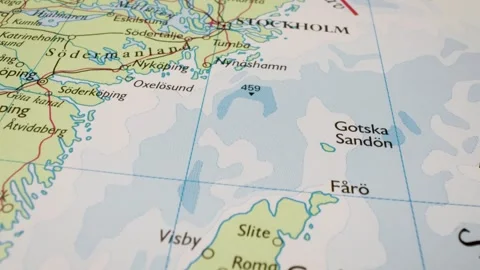 Gliding over the Baltic Sea from Gotland to Stockholm on an atlas map Stock Footage 340105558
