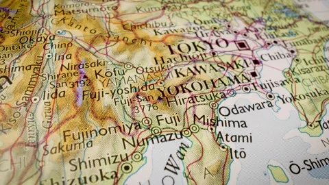 Gliding over a physical map to Tokyo, Japan Stock Footage 340106822