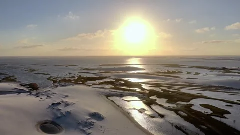 Gliding Over Reflective Water Patterns at Sunset in Lençóis Maranhenses Stock Footage 342444867