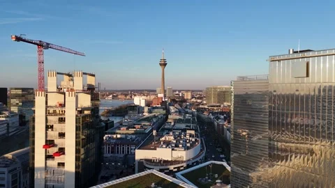 Gliding past mirrored tower toward Rheinturm Stock Footage 331196435