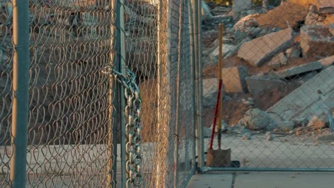 Gliding Shot of Locked Construction Gate Stock Footage 346201211