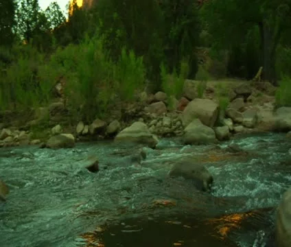 Gliding shot of river through stunning mountains Stock Footage 21683271