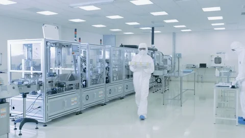 Gliding shot of Scientists Working in Pharmateutical Research Laboratory. Stock Footage