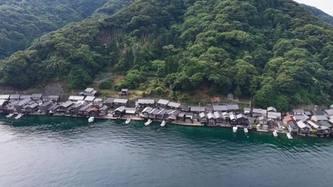 Gliding Sideways Along Ine Funaya Boathouses in Kyoto, Japan Stock Footage 342256857