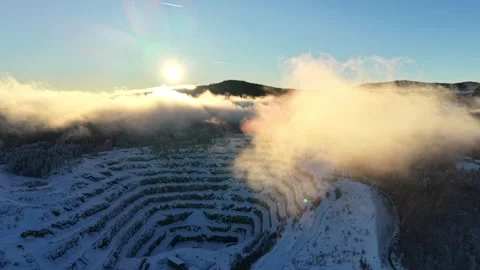 Gliding through clouds in the mountains with sun Stock Footage 325073917