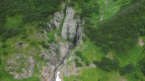 Gliding through a deep, vibrant mountain gorge Stock Footage 316802329
