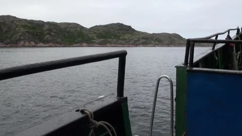 Gliding Through Gray Waters of the Barents Sea in Cloudy Weather 스톡 동영상 321064217