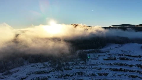 Gliding through misty clouds in the mountains Stock Footage 325073991