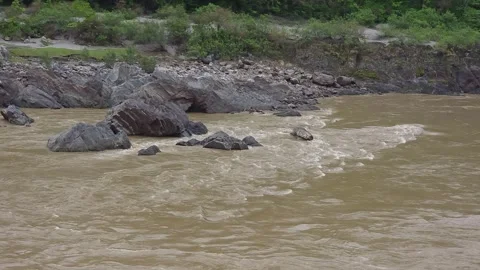 Gliding Through Nature: Boating in Rishikesh Stock Footage 313564208