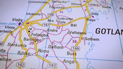 Gliding view over atlas map tracing the road network over Gotland Island Stock Footage 341750520