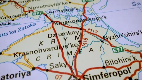 Gliding  view over atlas map tracking the route from Melitopol to Sevastopol Stock Footage 341750808