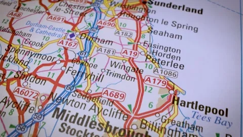 Gliding view over atlas map showing the road network  to Middlesbrough Stock Footage 341751429