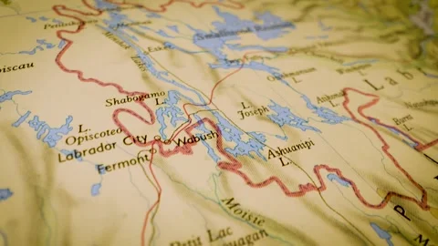 Gliding view over physical atlas map leading to Smallwood Reservoir, Canada Stock Footage 340917297
