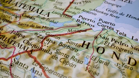 Gliding view over physical atlas map from Honduras to Guatemala Stock Footage 341750549