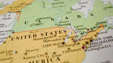 Gliding view from united states to canada on detailed political paper map Stock Footage 340105395