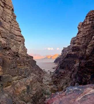 Glimpse between the mountains of the Wadi Rum desert in Jordan. Stock Photos