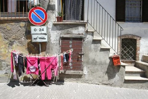 Glimpse with drying rack and road sign 写真素材