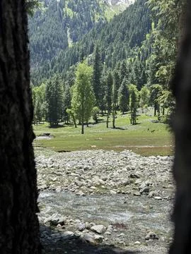 Glimpse of a Mountain Valley Landscape Stock Photos