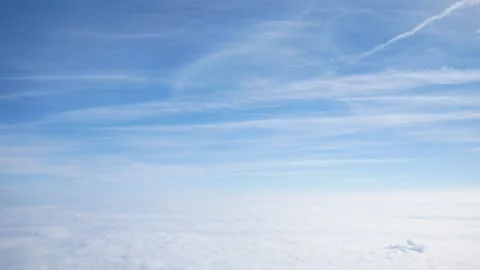 A Glimpse of the Sky From an Airplane Stock Footage 268503749