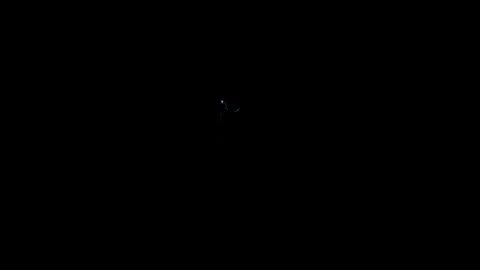 Glinting Lightning Magic Spark Particle Burst VFX Overlay Against Black Stock Footage 339080738
