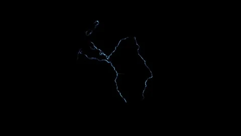Glinting Lightning Magic Spark Particle Burst VFX Overlay Against Black Stock Footage 339081164
