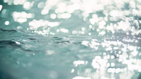 Glistening lake surface with light spots and ripples Stock Footage 345576682