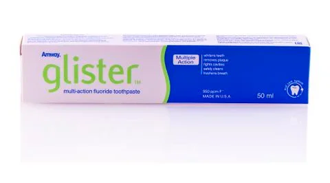 Glister toothpaste box on the white background Stock Photos