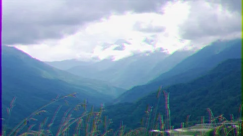 Glitch effect. Dry grass in the mountains. Panorama. Sochi, Russia 動画素材 107192186