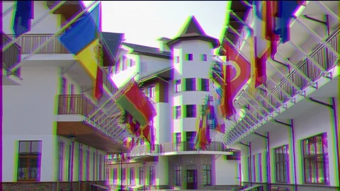 Glitch effect. Flags on buildings in the Olympic Village. Russia, Sochi Vídeo Stock 106821130