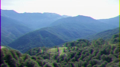 Glitch effect. Forest on the slopes mountains around the Olympic Village. Vídeo Stock 106815937