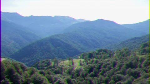 Glitch effect. Forest on the slopes mountains around the Olympic Village. Vídeo Stock 106816007