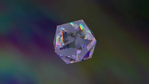 A glitch effect inside a crystal that spins rapidly on a colored background Stock Footage 144534543