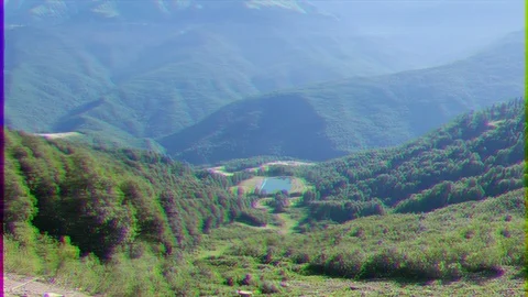 Glitch effect. Lake at the Rosa Khutor Olympic Village. Russia, Sochi Stock Footage 106754508