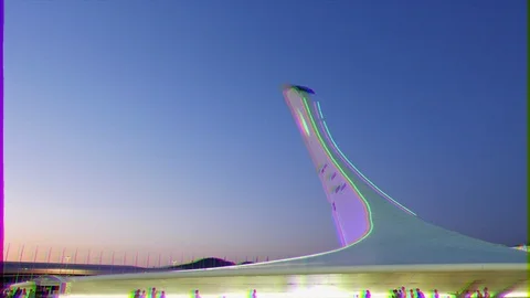 Glitch effect. The main Olympic torch, after sunset. Sochi, Russia Stock Footage 107080538